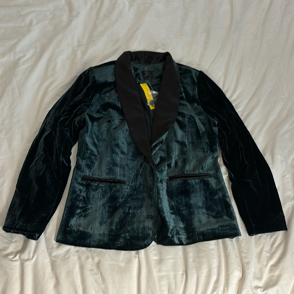 New without tags green crushed velvet with black satin color blazer. Size 12.